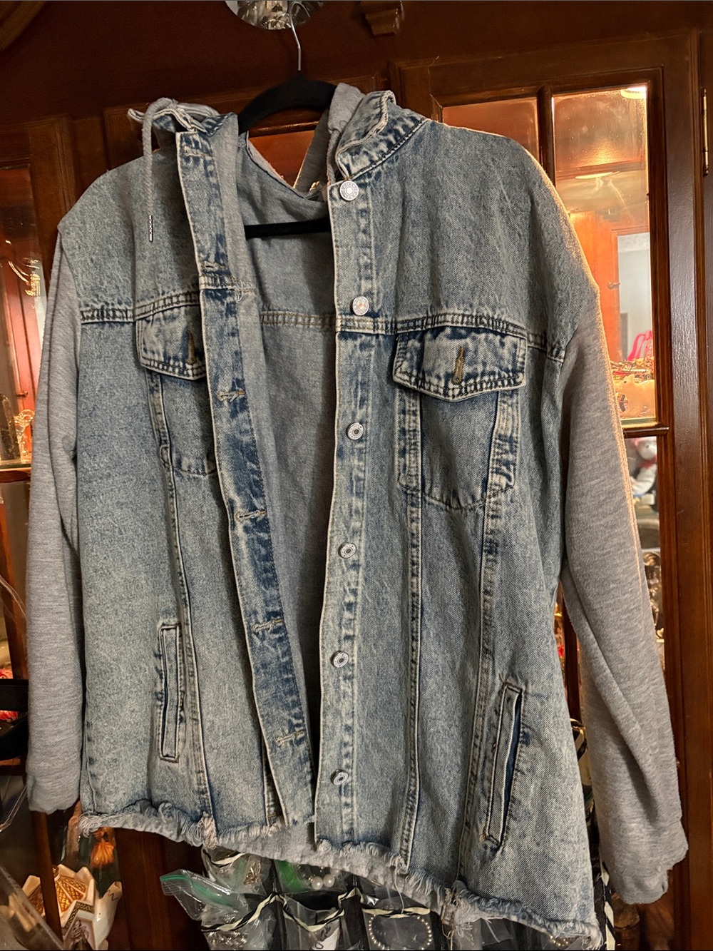 Light Wash Denim Hooded Jacket with Gray Knit Sleeves . W/ detachable hood.
